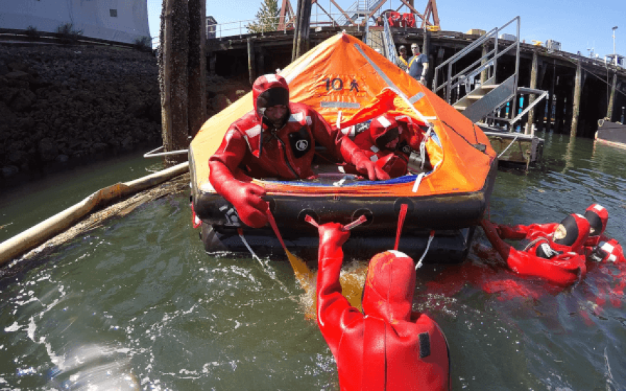 Mariners practicing abandon ship drills during an AMSEA training session.