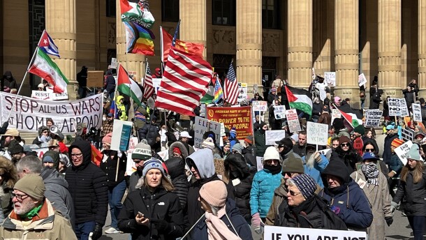 The No Kings Rally marches past the front steps of Buffalo's City Hall on Saturday, March 28, 2026.