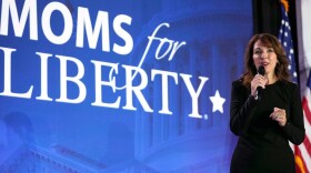 Woman speaking at podium