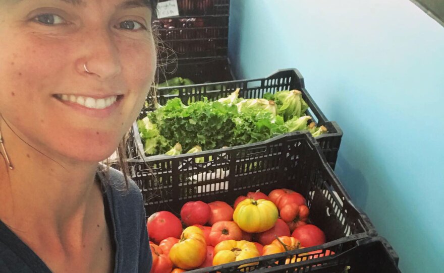 Sarah Voiland, who helps run Red Fire Farm, delivers fresh produce for the Brighton CSA in the Boston area in 2019.