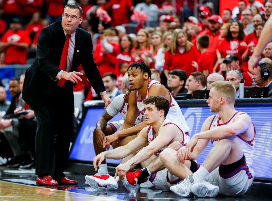 Bradley Braves head coach Brian Wardle speaks to players before they’re subbed in on Sunday, March 5, 2023, during the Missouri Valley Conference’s “Arch Madness” championship against the Drake Bulldogs at the Enterprise Center.