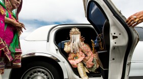 Kanwalpreet steps out of a white limo. He and Madhuri were married at the Gurudwara Singh Sabha of Washington in Renton. 
