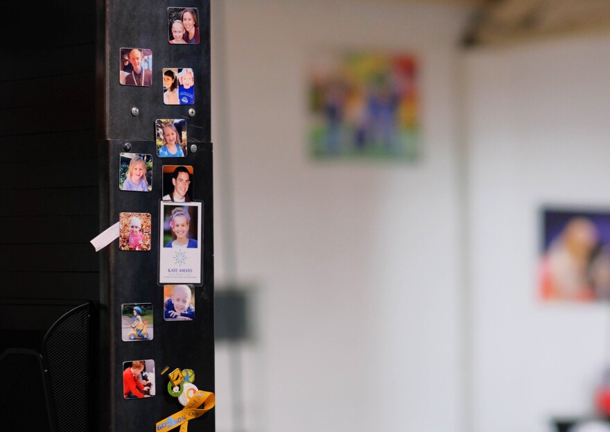 The walls of the cc-TDI lab showcase the kids and families affected by rare cancers and serve as a constant reminder to the scientists about the lives their work can touch.