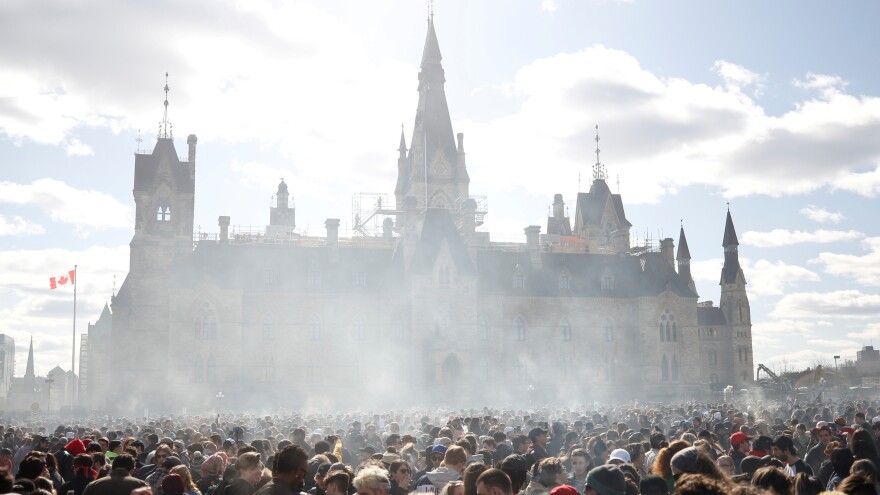 Canada's House of Commons voted to legalize recreational marijuana use, sending the bill to the Senate. In this photo from April 20, smoke rises during the annual 4/20 marijuana rally on Parliament Hill in Ottawa, Ontario.