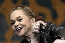 In this April 29, 2006 photo, Etta James performs during the 2006 New Orleans Jazz and Heritage Festival in New Orleans. James, the feisty rhythm and blues singer whose raw, passionate vocals anchored many hits and made the yearning ballad "At Last" an enduring anthem for weddings, commercials and even President Barack Obama.