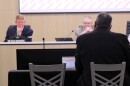 Gil Alvarez (foreground), deputy superintendent for Wichita Public Schools, presents a recommended bond proposal to the Wichita Board of Education. In the background are Superintendent Kelly Bielefeld and Board President Stan Reeser.