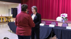 A voter speaks with Republican Del. Karen Greenhalgh (right). Greenhalgh is running in Virginia Beach’s 97th House District – one of the key suburban swing districts that will likely decide control of the General Assembly. (Photo by Mechelle Hankerson)