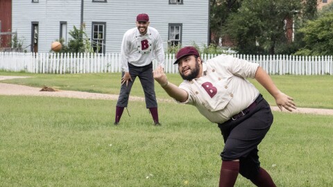 Diego Gomez delivers an underhand pitch during a game of vintage base ball at the Old Cowtown Museum on the Fourth of July.