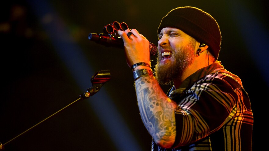 He hasn't traded in his truck. Brantley Gilbert performs at the release party for his latest album album, <em>The Devil Don't Sleep</em>.