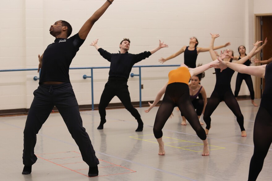 Jessica Lang Dance Company dancers Thomas Ragland (left) and John Harnage teach some of the company's repertoire to dance students at the Youth Performing Arts School during one of three master classes taught by the company. The dance company is in Louisville for a residency that includes classroom instruction, a performance and working with veterans.