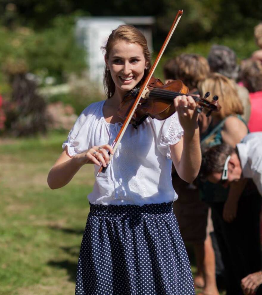 Same smile, just with a larger violin