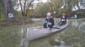 In a cove on the Connecticut River in Northampton, Massachusetts, art viewers paddled through "Swamp Show," an exhibit of art inspired by nature. Along with life vests, participants were given a prompt to write or draw while out on the oxbow. (Jill Kaufman/NEPM)