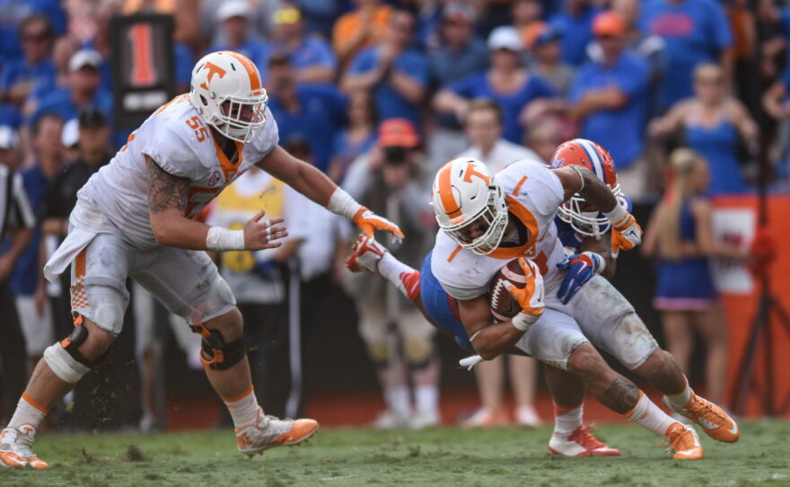 Florida defensive lineman Jonathan Bullard (90) wraps up Tennessee running back Jalen Hurd (1) .