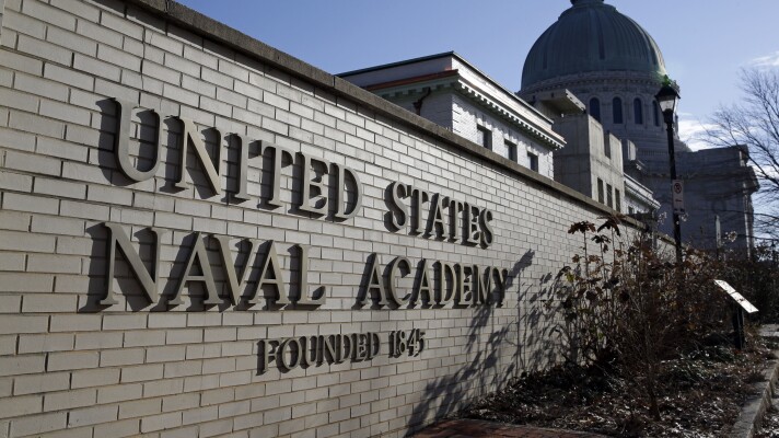FILE - An entrance to the U.S. Naval Academy campus in Annapolis, Md., is seen Jan. 9, 2014. (AP Photo/Patrick Semansky, File)