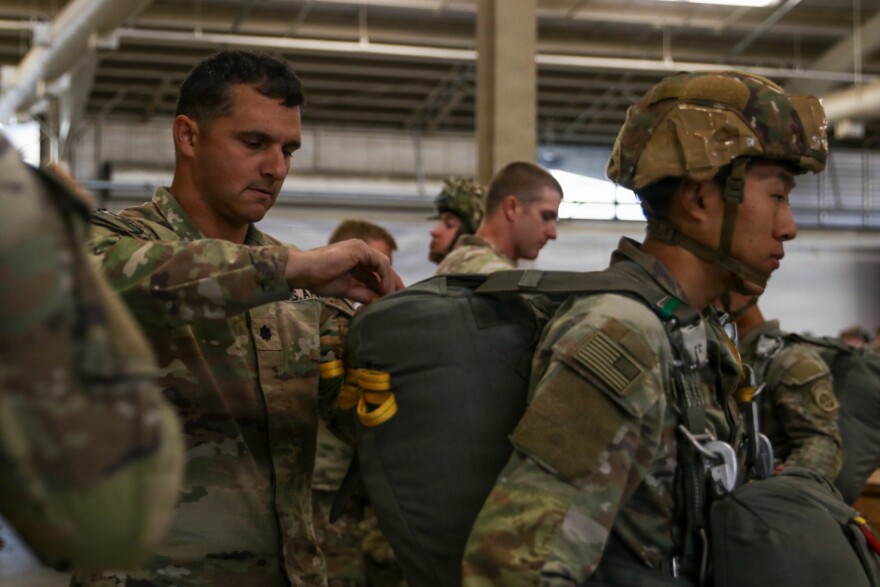 U.S. Army Lt. Col. Adam Nordin conducts an inspection on a paratrooper with the 82nd Airborne Division's 1st Brigade Combat Team during a routine operation at Fort Bragg in November 2025.