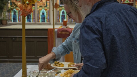 Residents dish up food at a recent EVPL SPEAK event