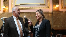 Sim Gill and Amy Daeschel share a smile at the clean slate press conference.