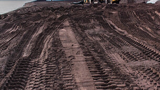 Stamp sand removal from the beach along Lake Superior is shown from 2019.