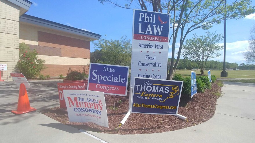 At an early voting site in Pitt County, voters were greeted with signs from some of the 17 GOP candidates seeking the nomination.