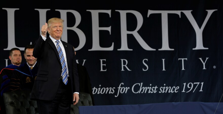 President Trump addresses the crowd before delivering the keynote address at Liberty University's commencement in Lynchburg, Va., on May 13.