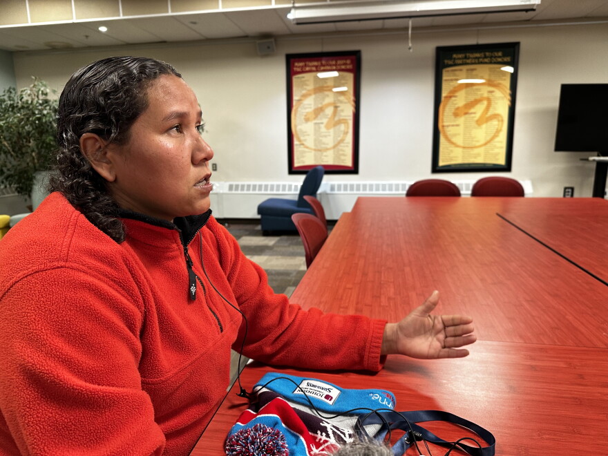 Libia Guzmán talks about fleeing Venezuela after receiving threats from her superiors in the Venezuelan military and finding family in the U.S. on Nov. 27 at Carbondale’s Third Street Center. Guzmán is part of a group of over 100 migrants, mostly from Venezuela, who recently arrived in the Roaring Fork Valley.