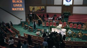 Mourners line up to pay their respects during Freddie Gray's funeral at the New Shiloh Baptist Church in Baltimore, Md., on Monday.