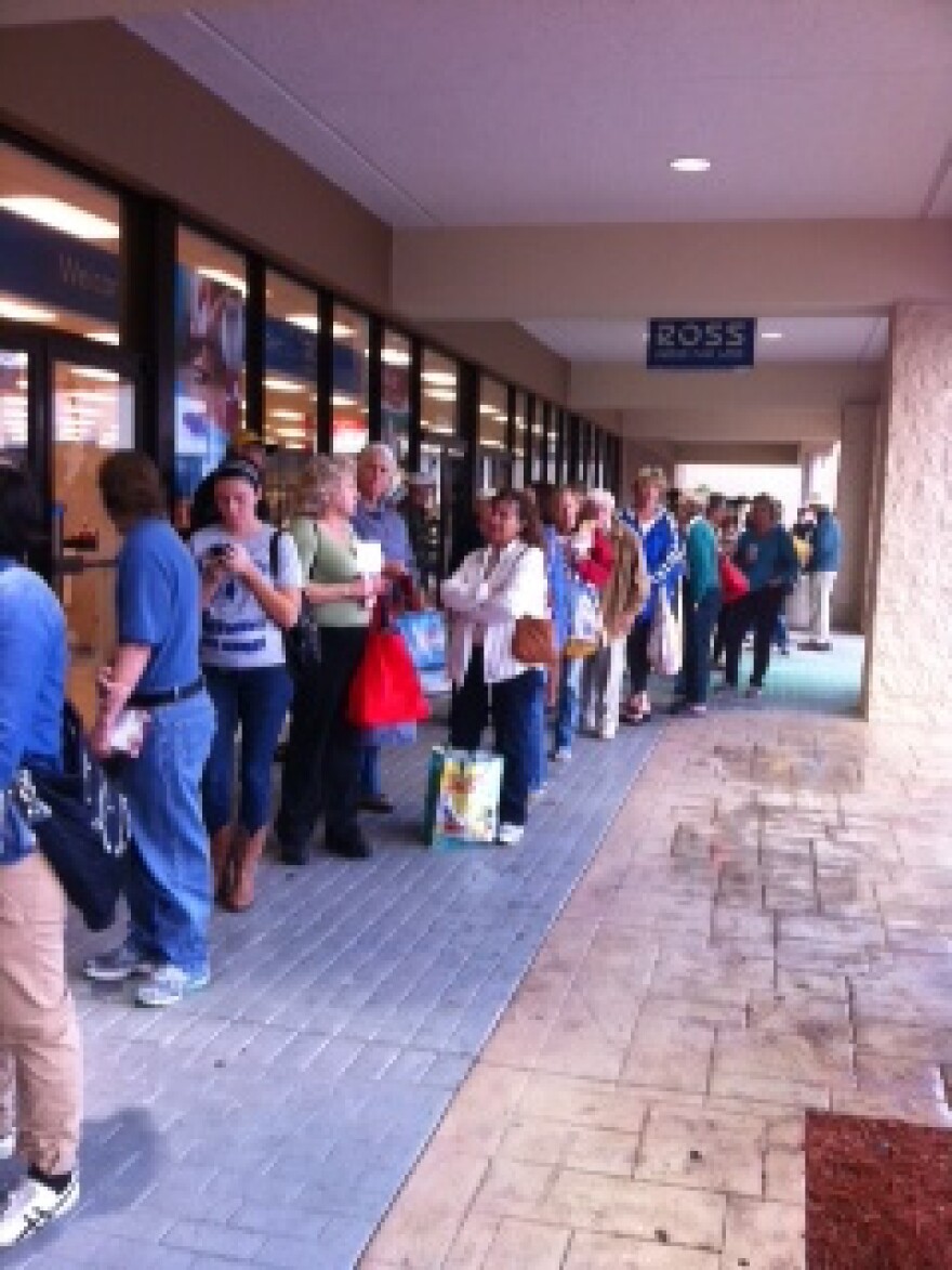 Dozens line up for the opening of Trader Joe's in Butler Plaza.