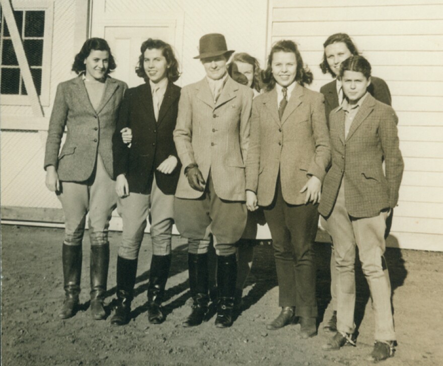 Professor Harriet Rogers with riding students at Sweet Briar, circa 1940. The school was noted for its equestrian program.