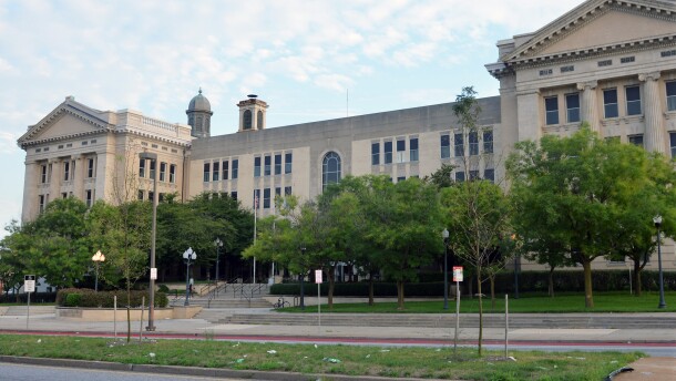 This photo shows the city headquarters of Baltimore City Public Schools, where administrators are deciding how to spend a large infusion of federal dollars for COVID-19 relief, Thursday, Aug. 26, 2021 in Baltimore. Education leaders say the money has the potential to transform aspects of public school programming while also providing a rare opportunity to make some long-needed infrastructure upgrades. (AP Photo/David McFadden)