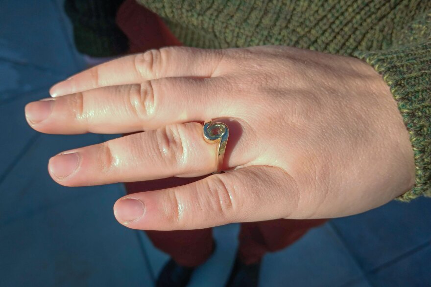 Devon Cole sourced her engagement ring from a small vendor in Montana who has his own sapphire claim. Due to the high cost of gold, she and her fiancé might use repurposed family jewelry to make their wedding bands.