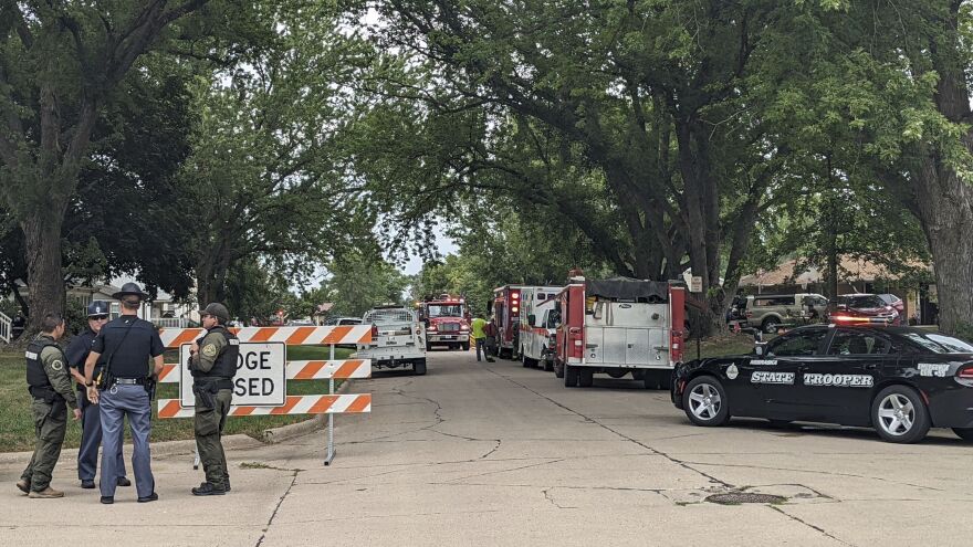 Barricades block off a portion of Elm Street in Laurel, Neb., Thursday, Aug. 4, 2022. The Nebraska State Patrol is investigating a situation with multiple fatalities that occurred in Laurel on Thursday morning.