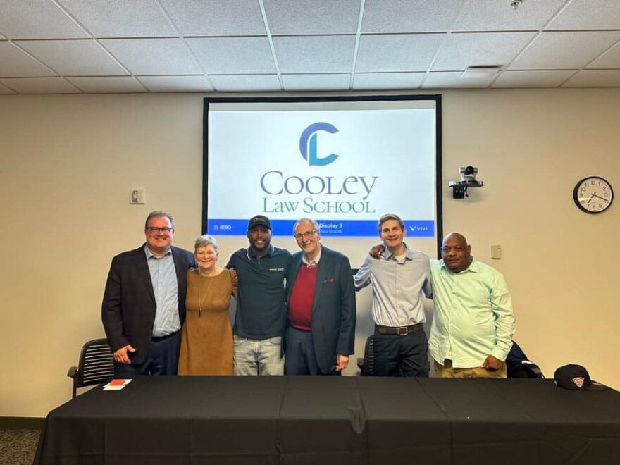 Duane Williams, far right, is active with the Organization of Exonerees, and leans heavily on fellow members for support now.