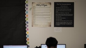 Students work under Ten Commandments and Bill of Rights posters on display in a classroom at Lehman High School in Kyle, Texas, Thursday, Oct. 16, 2025.