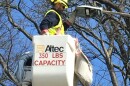 Ameren worker installs LED streetlight