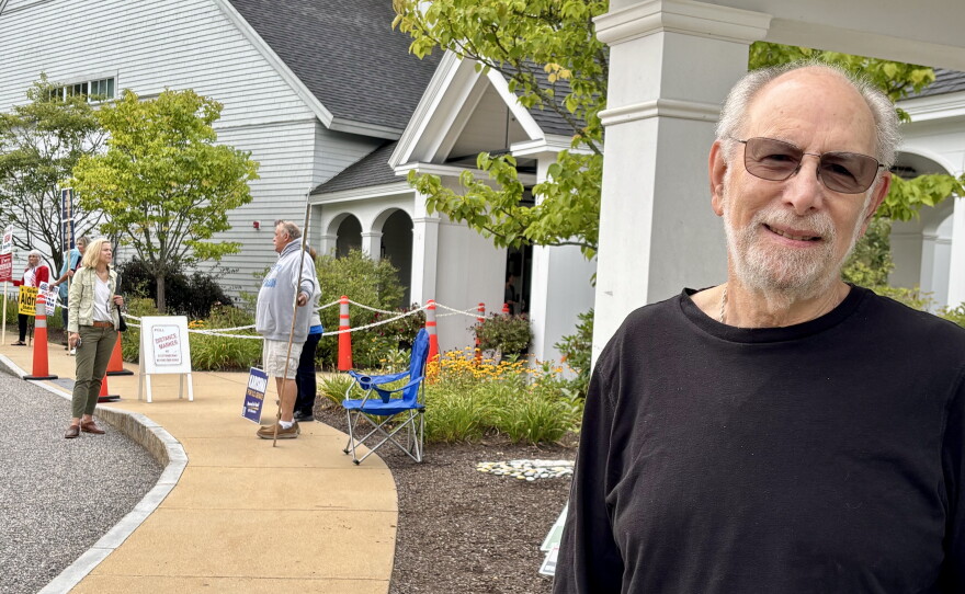 A Gilford voter outside the polls on NH primary election day Sept. 8