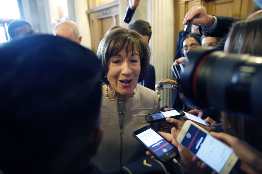 Sen. Susan Collins, R-Maine, talks with reporters after speaking on the Senate floor, on Capitol Hill, Friday, Oct. 5, 2018 in Washington about her vote on Supreme Court nominee Brett Kavanaugh. 