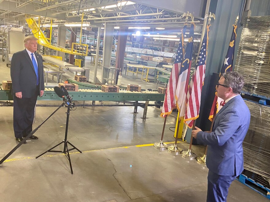 Spectrum News anchor Tim Boyum interviewing former President Donald Trump