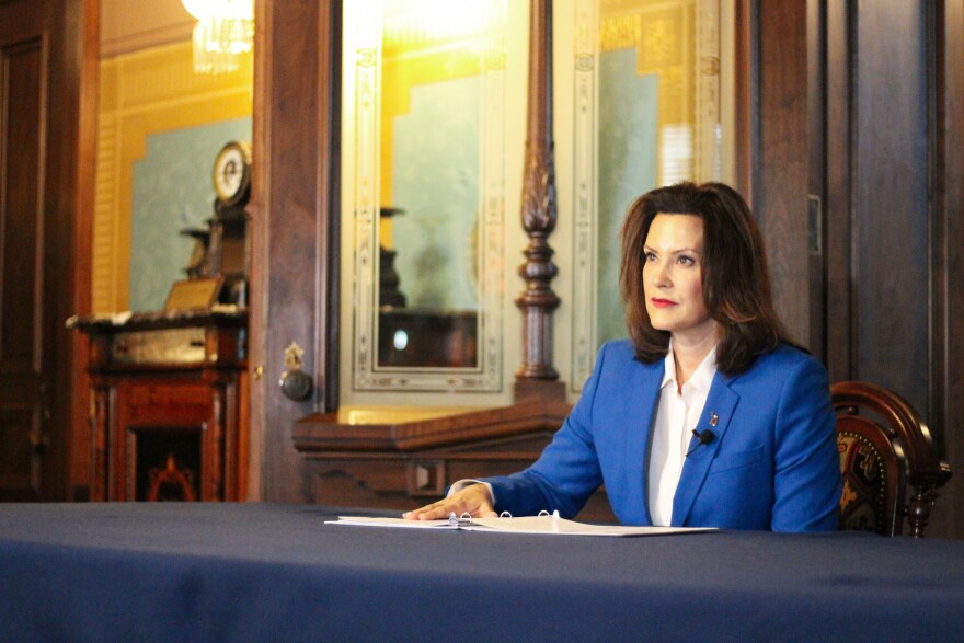 gretchen whitmer sitting at table