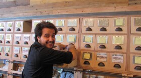 Ben Perez works behind the counter at the new Dockside SODO marijuana retail store.