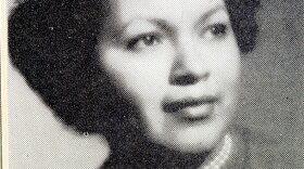 A black and white photo of a woman named Martha Bassett