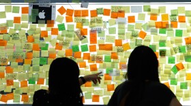 <p>Messages posted on a glass window pay tribute to the late Apple co-founder Steve Jobs outside the Apple store in Hong Kong.</p>