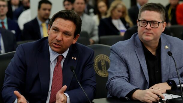 FRANKFORT, Feb. 18 – Florida Governor Ron DeSantis (left) and Rep. Jason Petrie, R-Elkton, present House Concurrent Resolution 45, a proposal related to the federal budget, during Wednesday’s House Committee on Elections, Constitutional Amendments