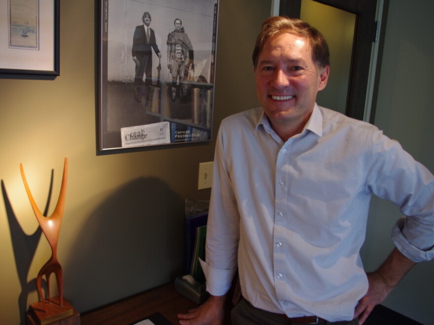 The sculpture on Peter Steinbrueck's desk belonged to his father. The dancer figure, with its arms skyward, served as inspiration for the Space Needle's design.