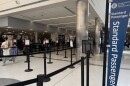 Dayton's TSA agents have been showing up to work to keep lines moving at Dayton International Airport, despite missing two and a half paychecks.