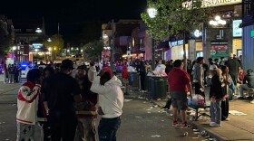 People gather on Kirkwood near Sample Gates during Little 500 weekend.