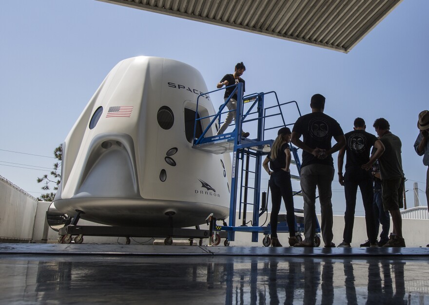A mockup of the Crew Dragon spacecraft was on display during a 2018 media tour of SpaceX's headquarters and rocket factory in Hawthorne, Calif.