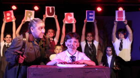 Allison Lund as Headmistress Trunchbull and Frankie Savage as Bruce in chocolate cake scene from 'Matilda."