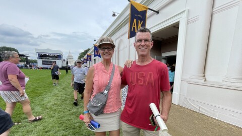 couple in front of AK banner