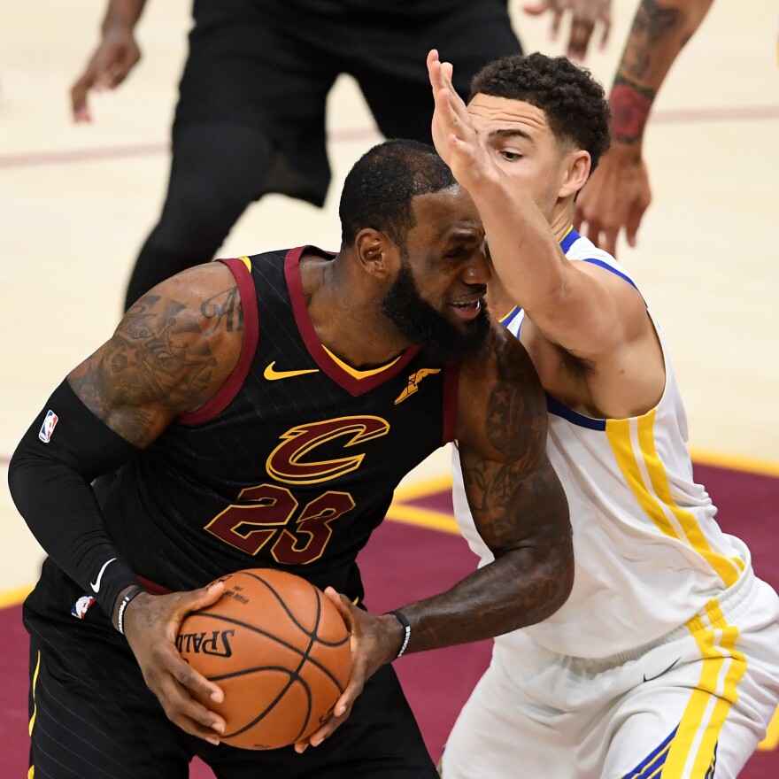 LeBron James runs into an extended metaphor Friday against Klay Thompson of the Golden State Warriors during Game Four of the 2018 NBA Finals at Quicken Loans Arena on in Cleveland. Though James put in his typically stellar performance in the Finals, Warriors easily swept the Cavaliers.