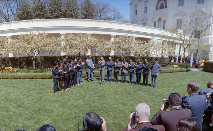 President Richard Nixon greets officials and members of the U.S. and Chinese table tennis teams at the White House on April 18, 1972.
